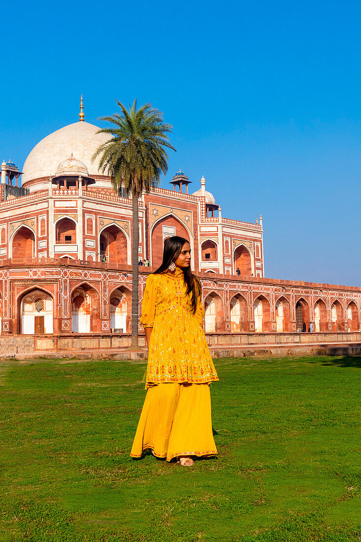 Young Indian Girl in front of Humayun's Tomb, UNESCO World Heritage Site, Delhi, India, South Asia, Asia