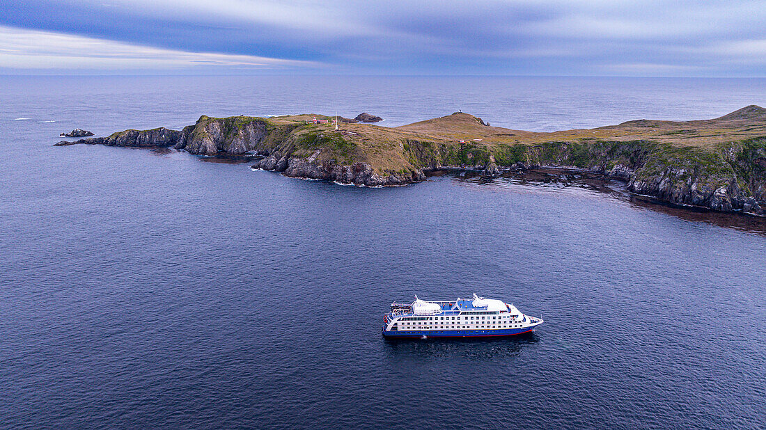 Aerial of a cruise ship anchoring at Cape Horn, southern most point in South America, Hornos island, Tierra del Fuego, Chile, South America