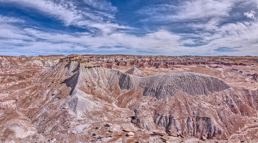 A ridge of gray bentonite viewed from a nearby flat top mesa on the south end of Petrified Forest National Park, Arizona, United States of America, North America