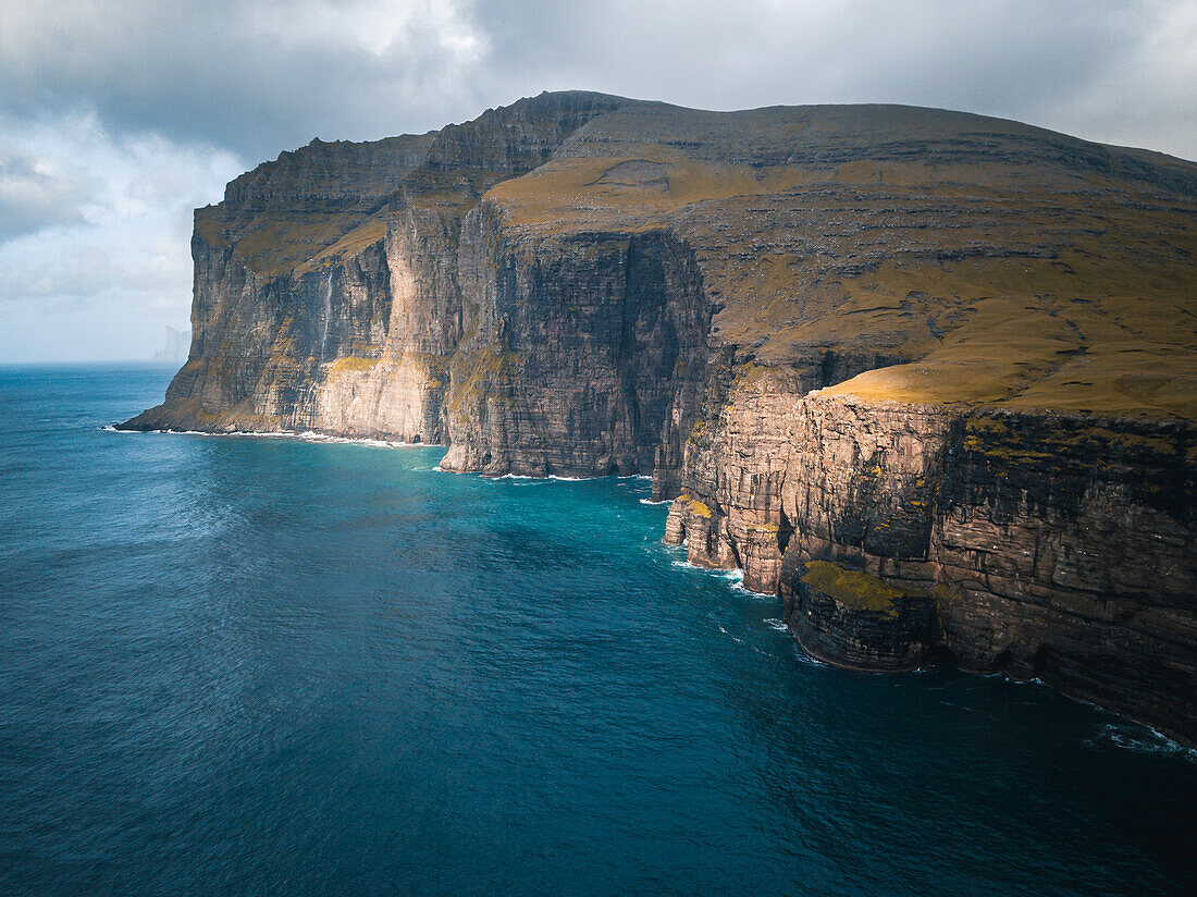 Aerial shot of Vagar island shores in the Faroe Islands, Denmark, North Atlantic, Europe