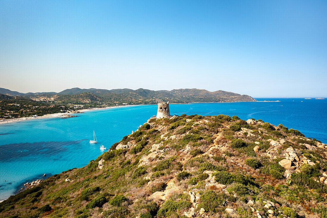 Aerial drone view of historic tower with Porto Giunco beach with white sand and turquoise water, Sardinia, Italy, Mediterranean, Europe