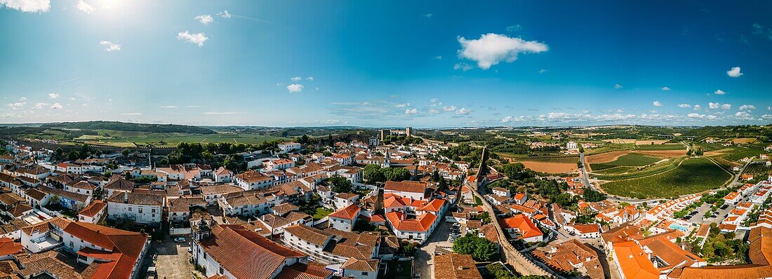 Aerial drone panoramic view of Obidos, a town in the Oeste region, historical province of Estremadura and Leiria district, Portugal, Europe