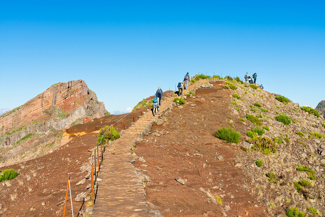 Hikers on hiking trail around Pico do Arieiro peak, Santana, Madeira, Portugal, Atlantic, Europe