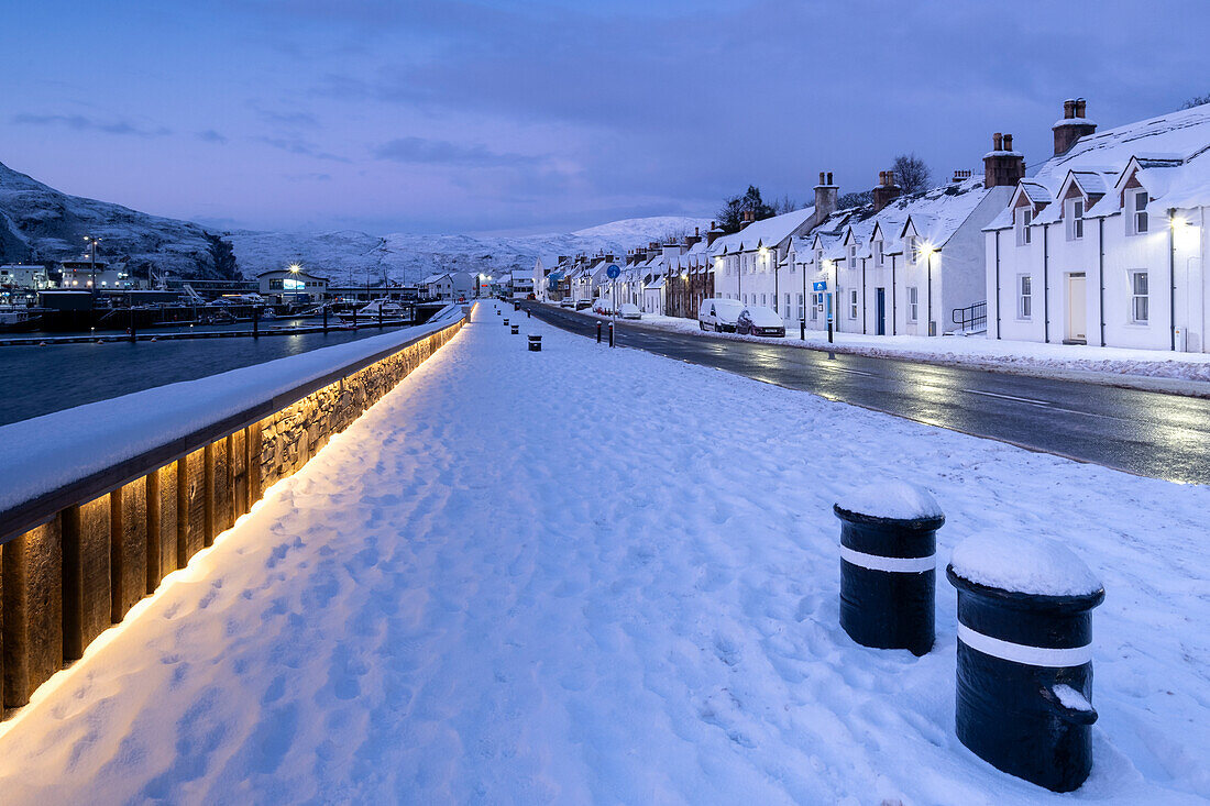 Ullapool Harbourfront at dusk in winter, Ullapool, Ross and Cromarty, Scottish Highlands, Scotland, United Kingdom, Europe