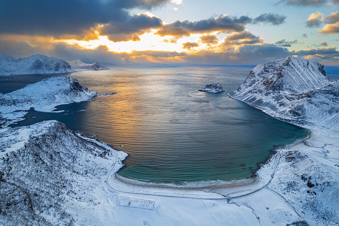 Winter aerial view of a beach covered with snow at sunset, Vik beach, Vestvagoy, Lofoten Islands, Norway, Scandinavia, Europe