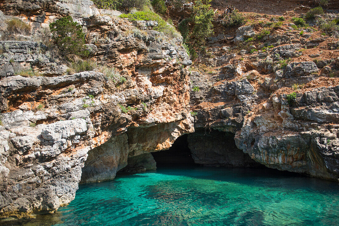 Cave in Dafines bay, Peninsula of Karaburun, within the Karaburun-Sazan Marine Parc, Vlore Bay, Albania, Europe