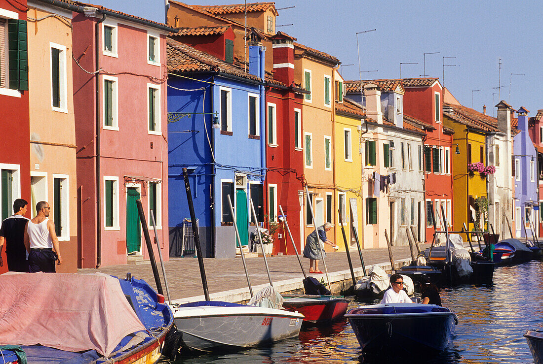 Colourfully painted houses along a canal in Burano island, Venice, UNESCO World Heritage Site, Veneto region, Italy, Europe