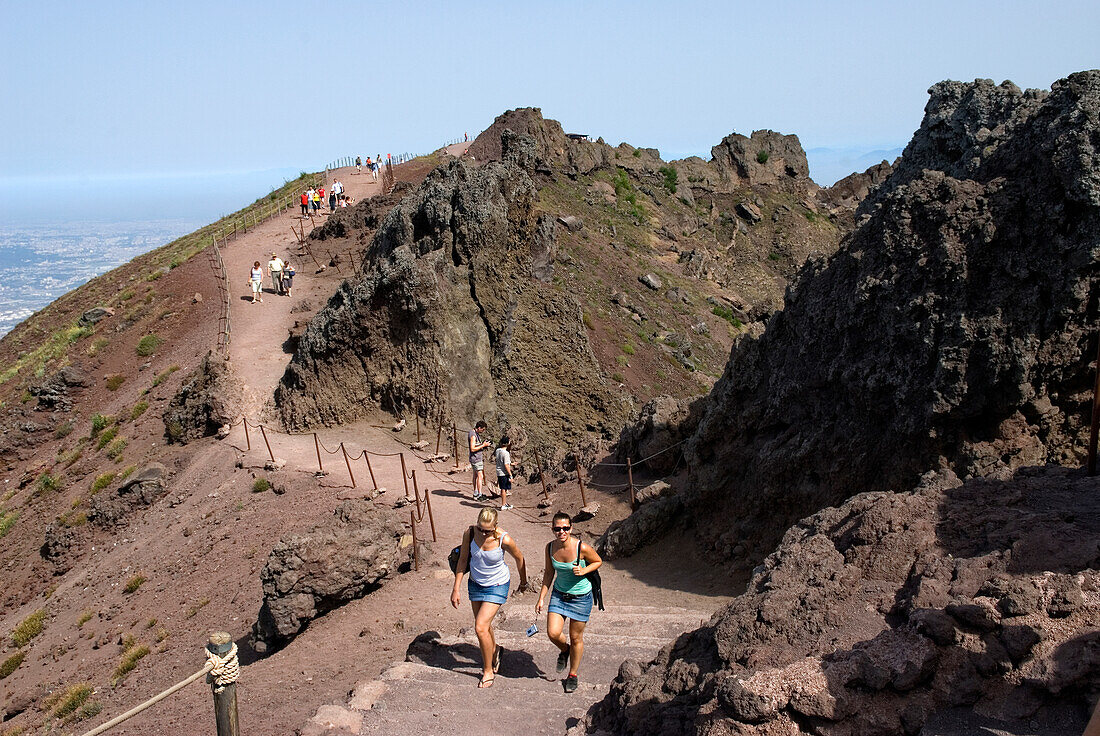 People walking on the edge of the crater of Mount Vesuvius, Province of Naples, Campania region, Italy, Europe