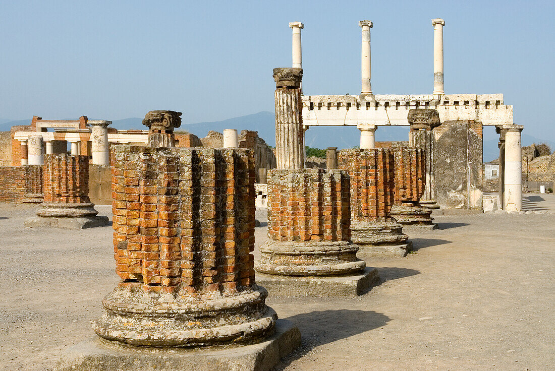 Columns surrounding the Forum, archaeological site of Pompeii, UNESCO World Heritage Site, province of Naples, Campania, Italy, Europe