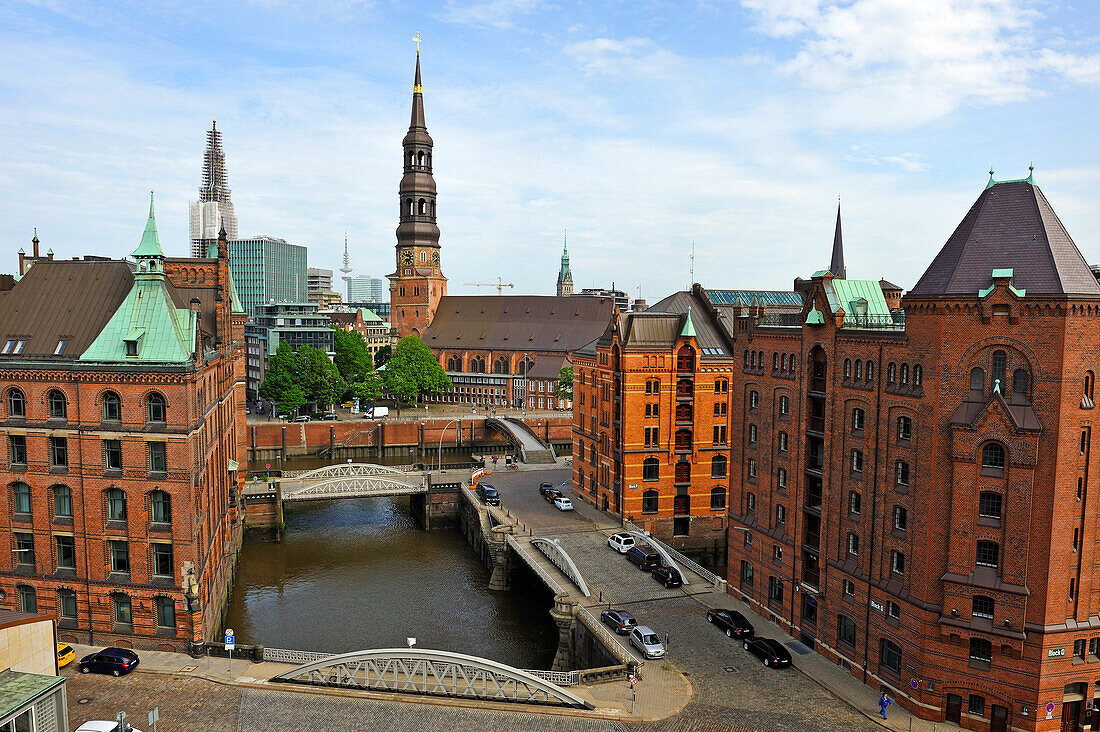 Aerial view of the Kleines Fleet canal in the Speicherstadt (City of Warehouses) with St. Catherine's Church in the background, HafenCity district, Hamburg, Germany, Europe