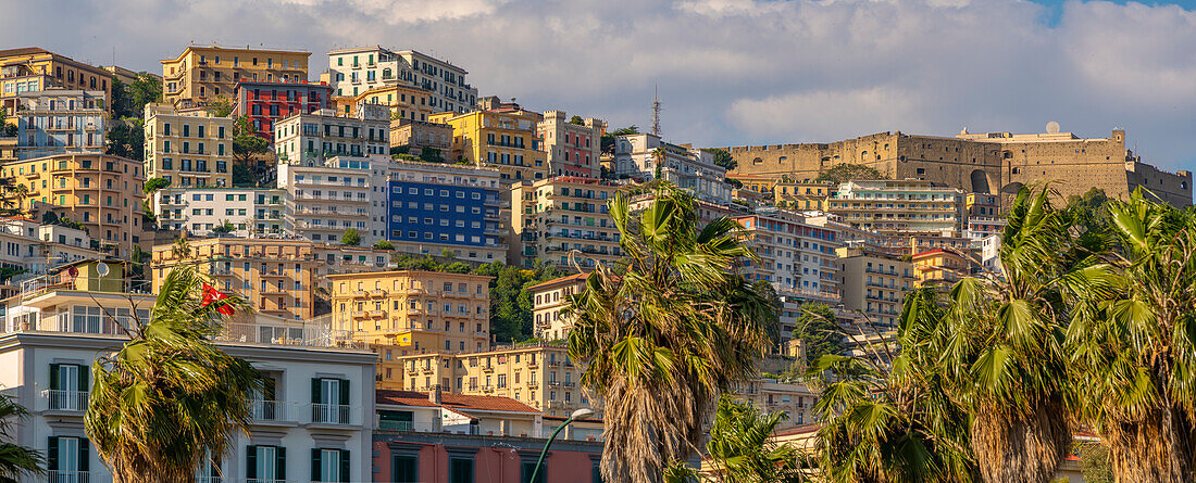 View of pastel coloured villas and Sant'Elmo Castle from Rotonda Diaz, Naples, Campania, Italy, Europe