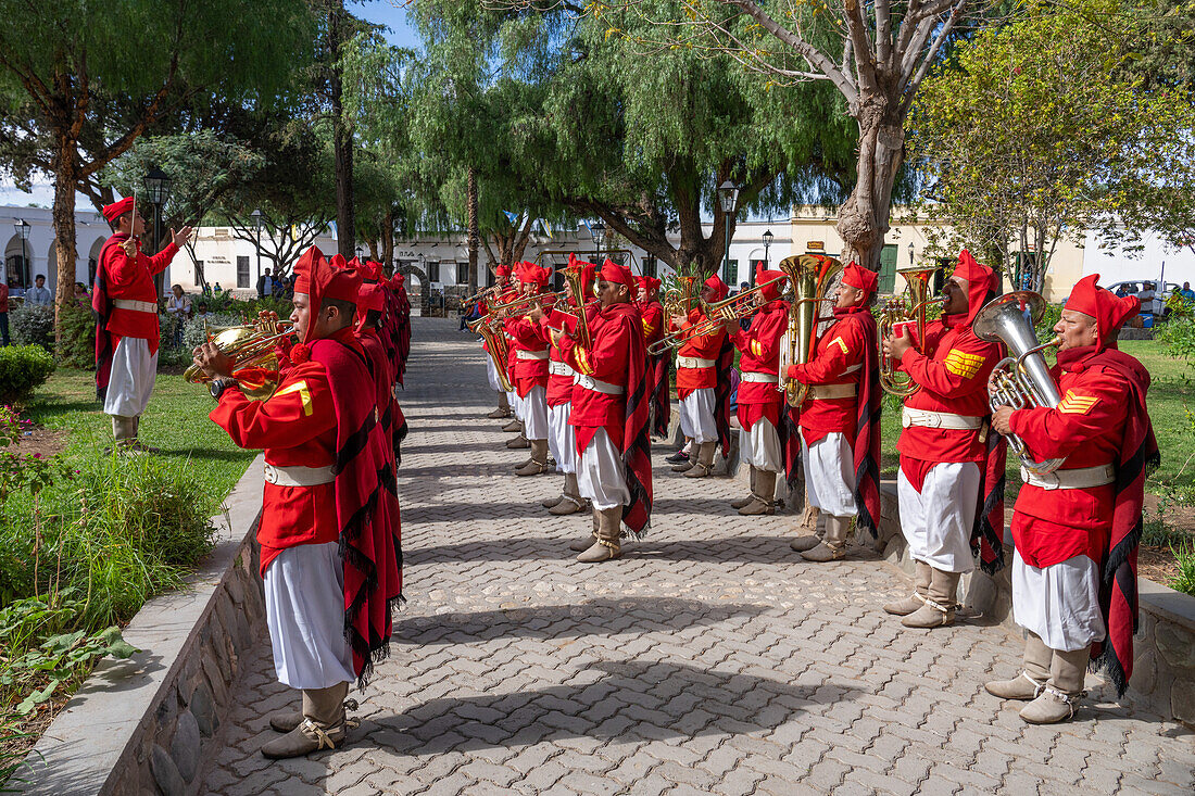 The band of the Infernales de Guemes, 5th Mountain Exploration Cavalry Regiment, play at a festival in Cachi, Argentina. Uniforms copy those worn by the original gaucho militia of General Guemes in 1815.