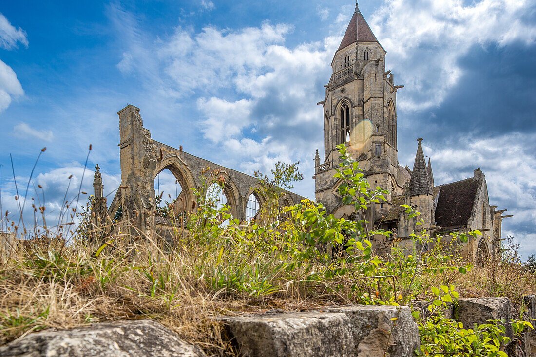 A captivating view of Saint-Etienne-le-Vieux Old Church in Caen, Normandy, France. The historical architecture stands amidst the scenic surroundings.