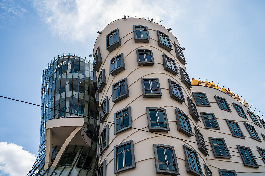 The Dancing House, or Ginger and Fred (Tancící dum), is the nickname given to the Nationale-Nederlanden building on the Rašínovo nábreží in Prague, Czech Republic.