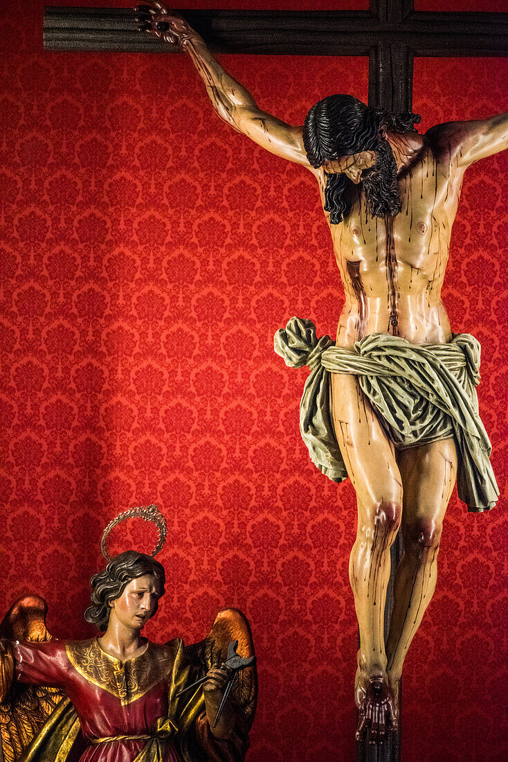 A detailed view of the Cristo de la Vera Cruz sculpture by Francisco Buiza in Pilas, Sevilla, Spain. Religious and artistic representation of crucifixion.