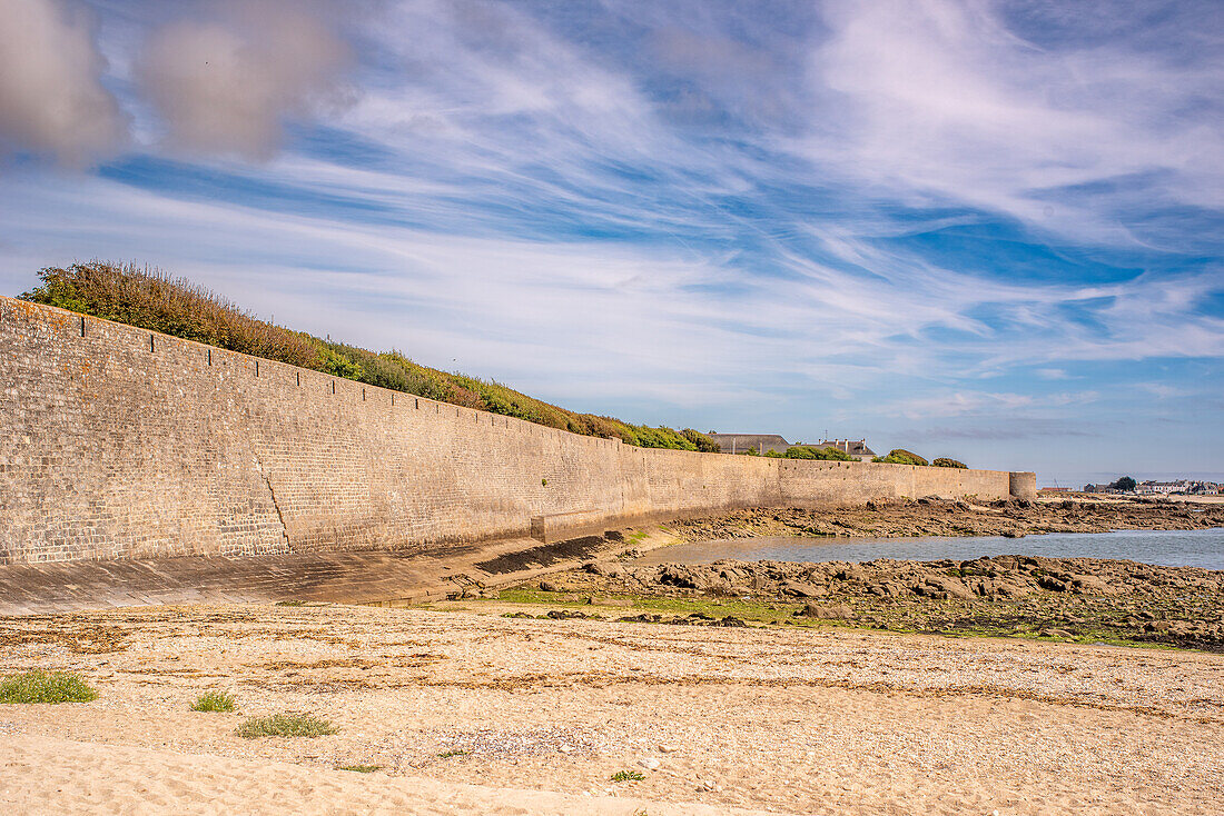 A stunning view of the Port Louis Citadelle wall located in Lorient, Brittany, France, showcasing its architectural grandeur by the coast.