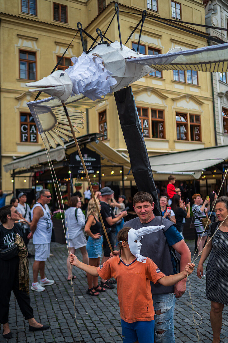 Parade of puppets from Marián Square to Old Town Square during the Prague Street Theatre Festival Behind the Door, Prague, Czech Republic