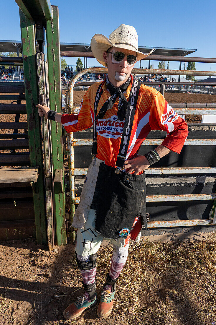 A PRCA rodeo clown / bull fighter in his costume at a rodeo in rural Utah.