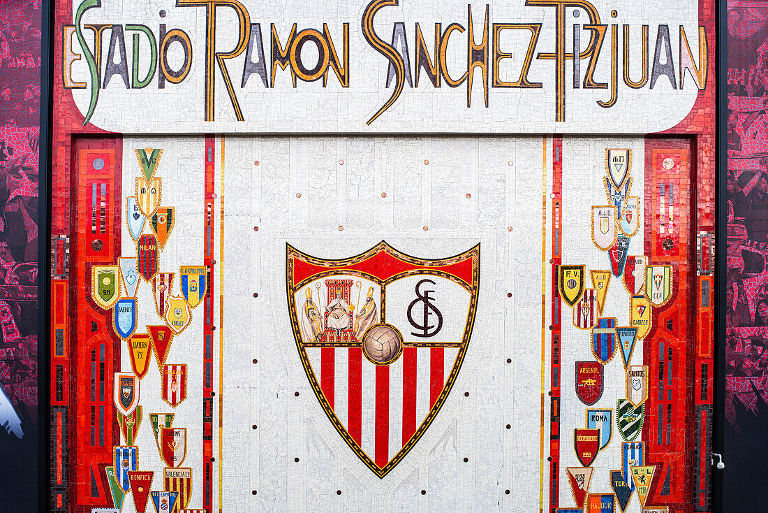 Ceramic mosaic artwork by Santiago del Campo from 1982 at Estadio Ramón Sánchez Pizjuán, featuring soccer emblems in Seville, Spain.