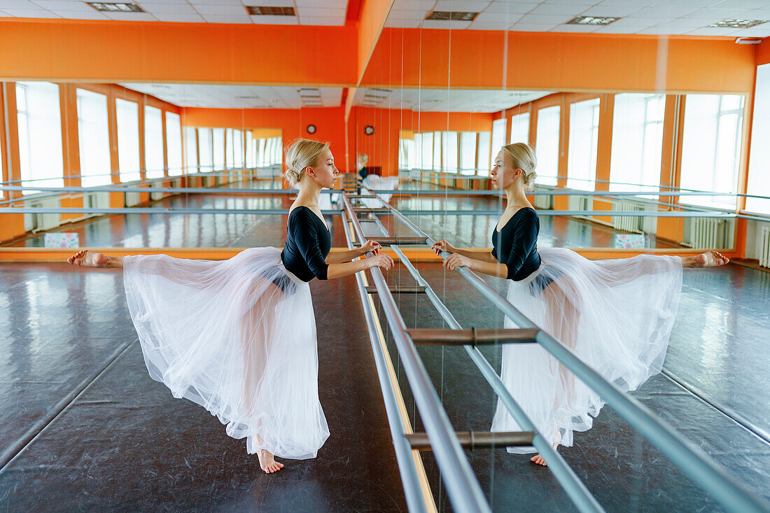 Ballerina practicing in ballet studio