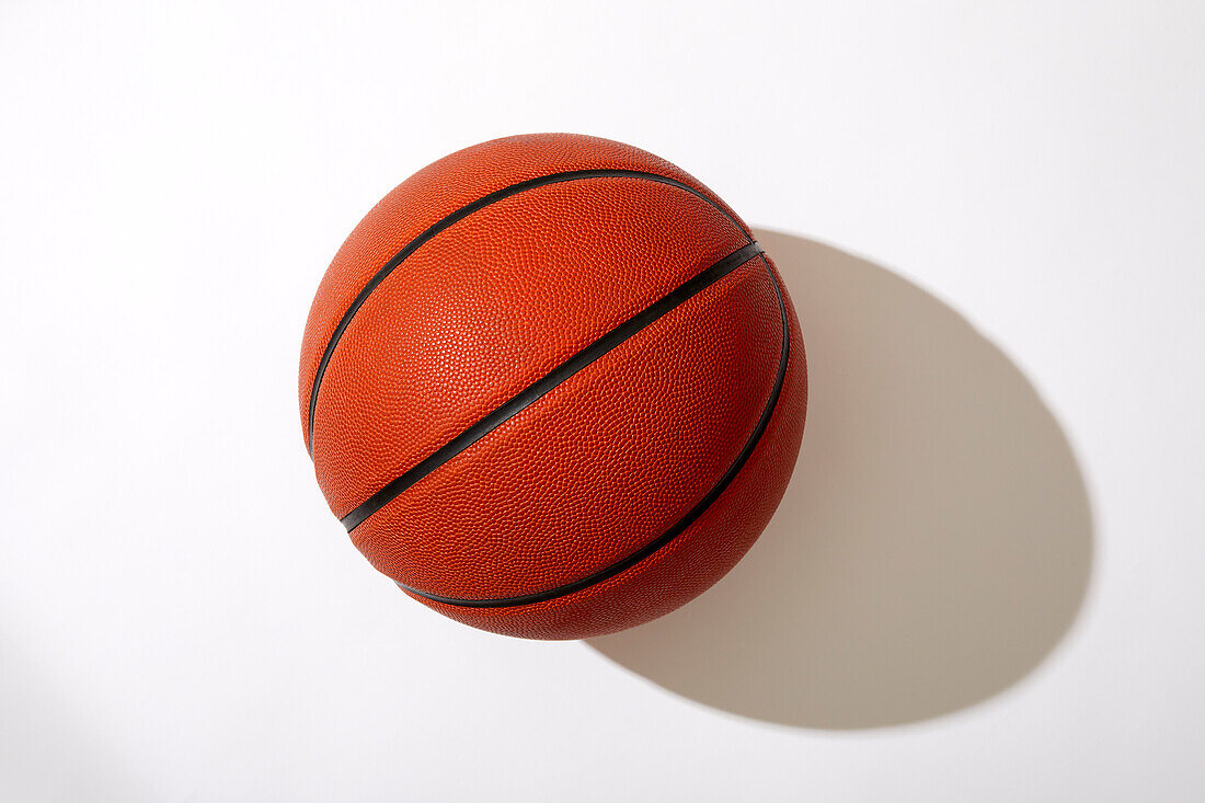 Overhead view of basketball on white background