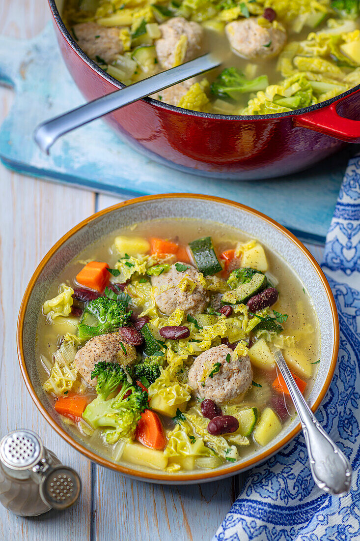 Minestrone with chicken balls and kidney beans