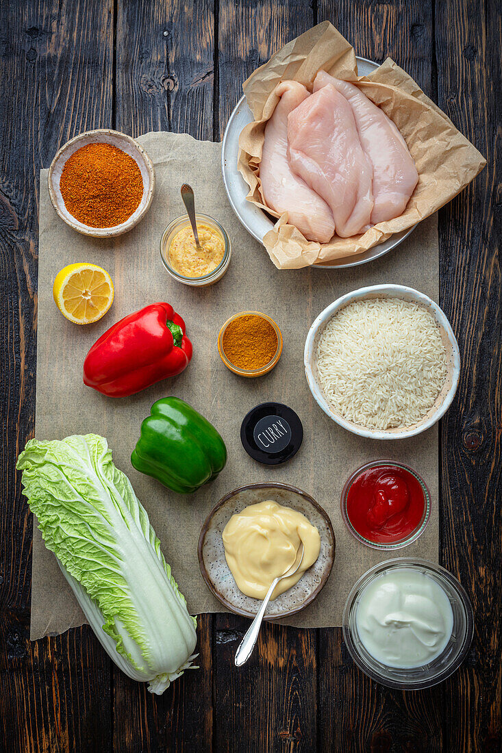 Ingredients for pulled chicken with curry rice and salad