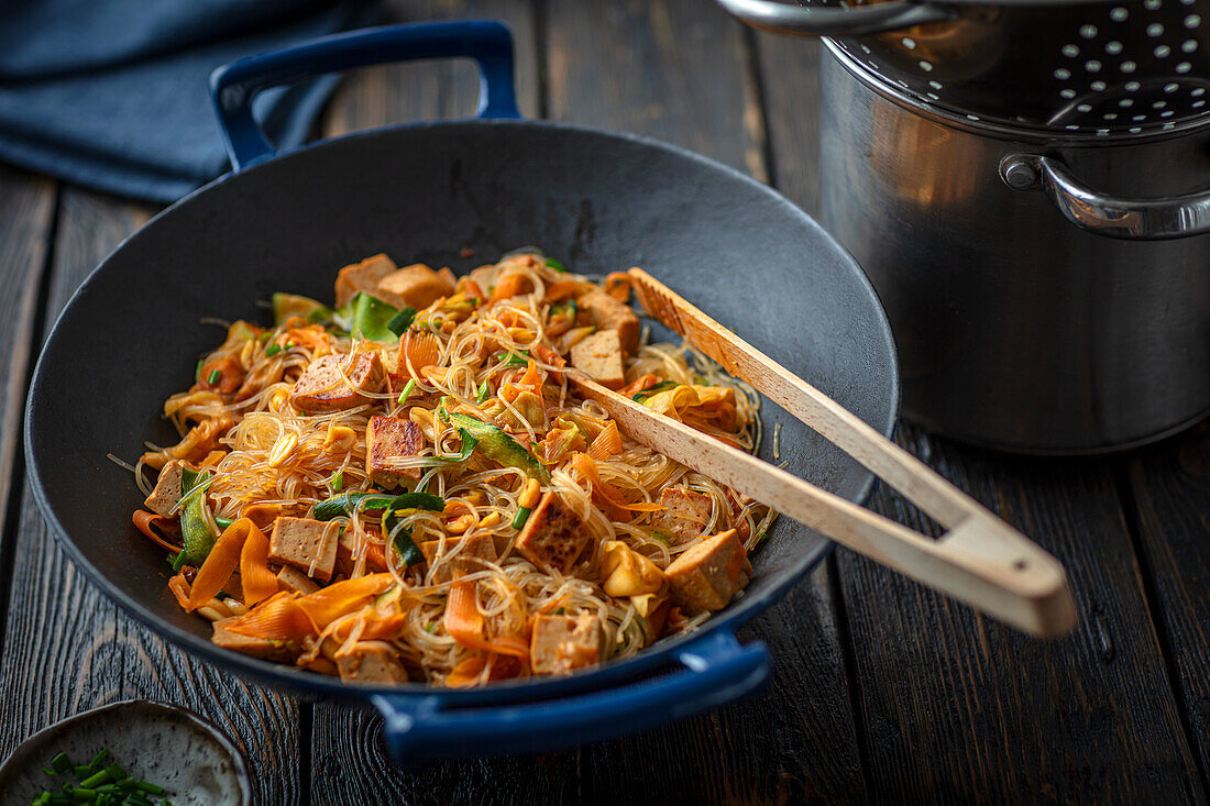 Soy noodles with tofu, vegetables and peanuts