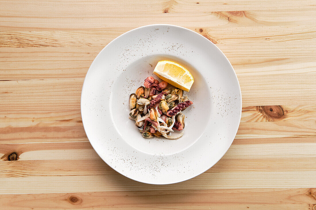 Seafood salad with squid, prawns and mussels