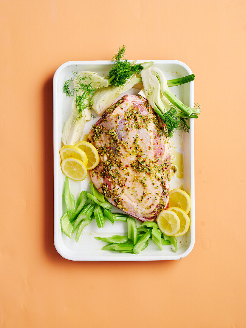 Greek roast lamb with vegetables before roasting