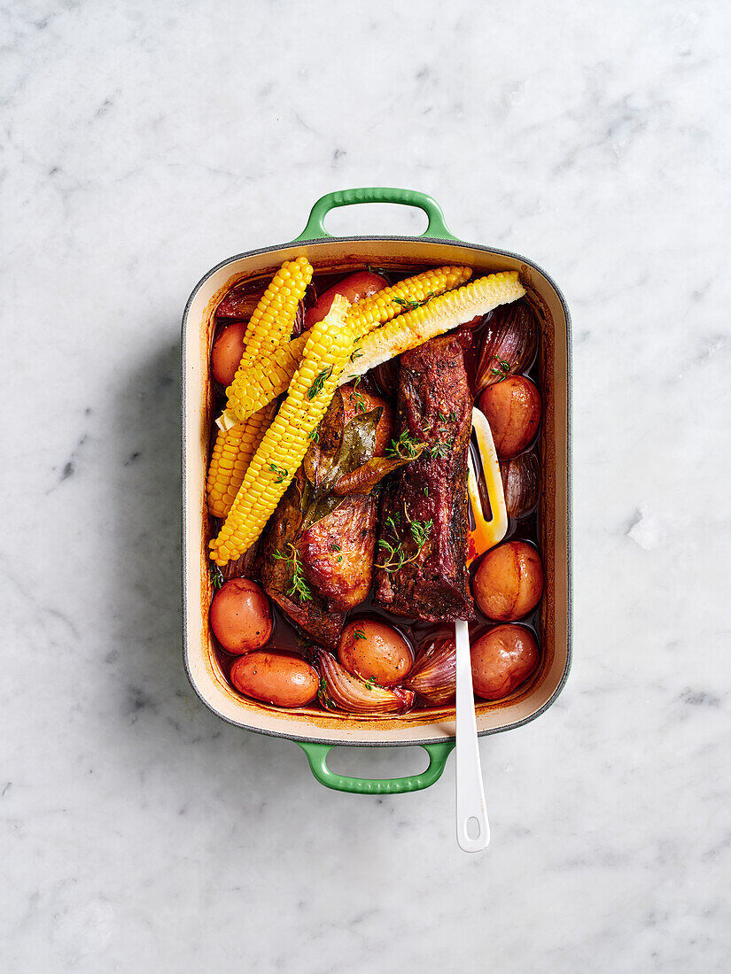 Beef brisket with maple syrup bourbon glaze and corn