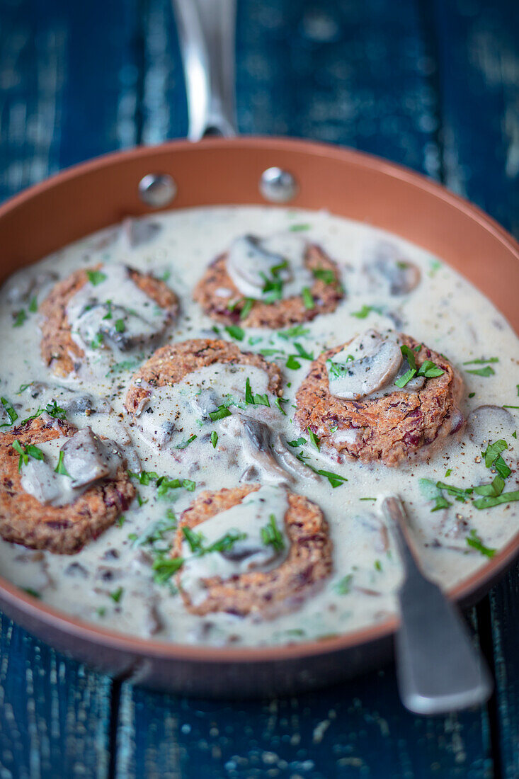 Bean cakes with mushroom sauce