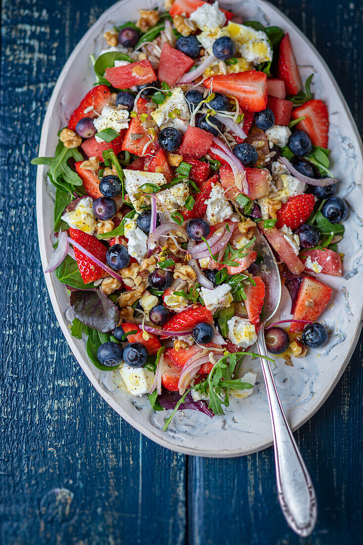 Summery watermelon salad with berries and feta