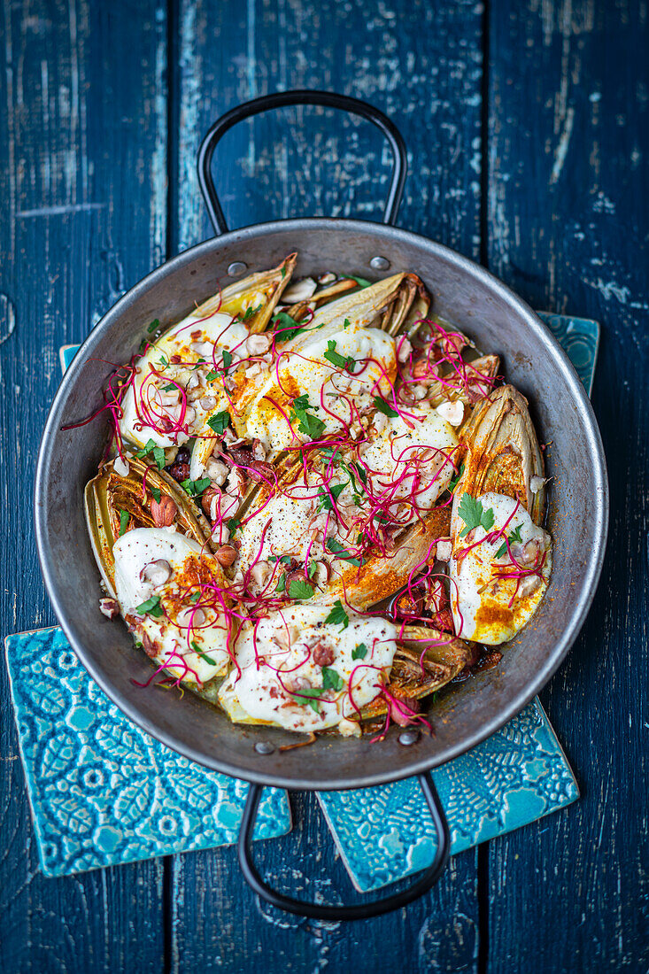 Baked chicory with mozzarella and curry