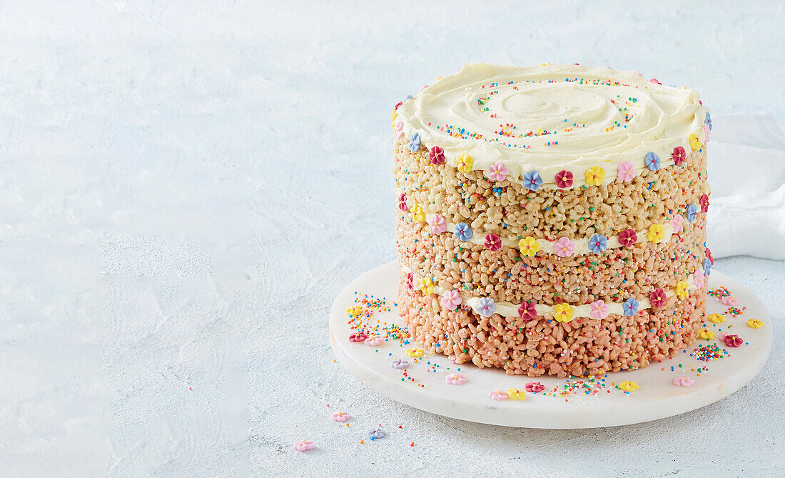 Birthday cake made from puffed rice with colourful sugar decoration