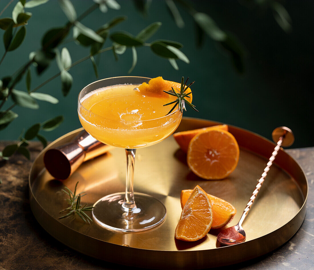 Orange cocktail with rosemary