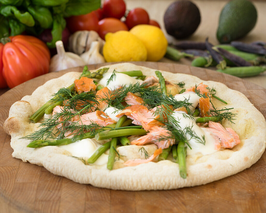 Pizza bianca with salmon, asparagus and dill