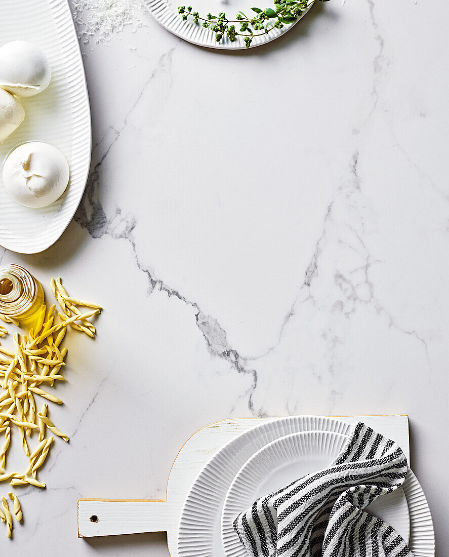 Marble base with ingredients for Italian pasta dishes