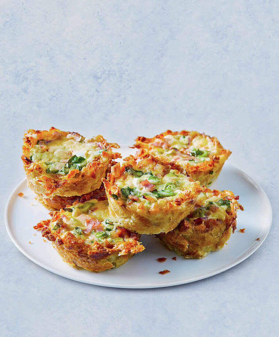 Cheesy potato crust muffins with kale and mushrooms