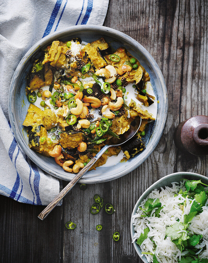 Aubergine and banana peel curry with rice and cashew nuts