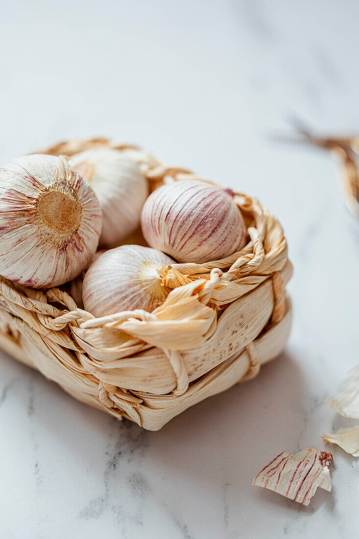 Basket with fresh local garlic