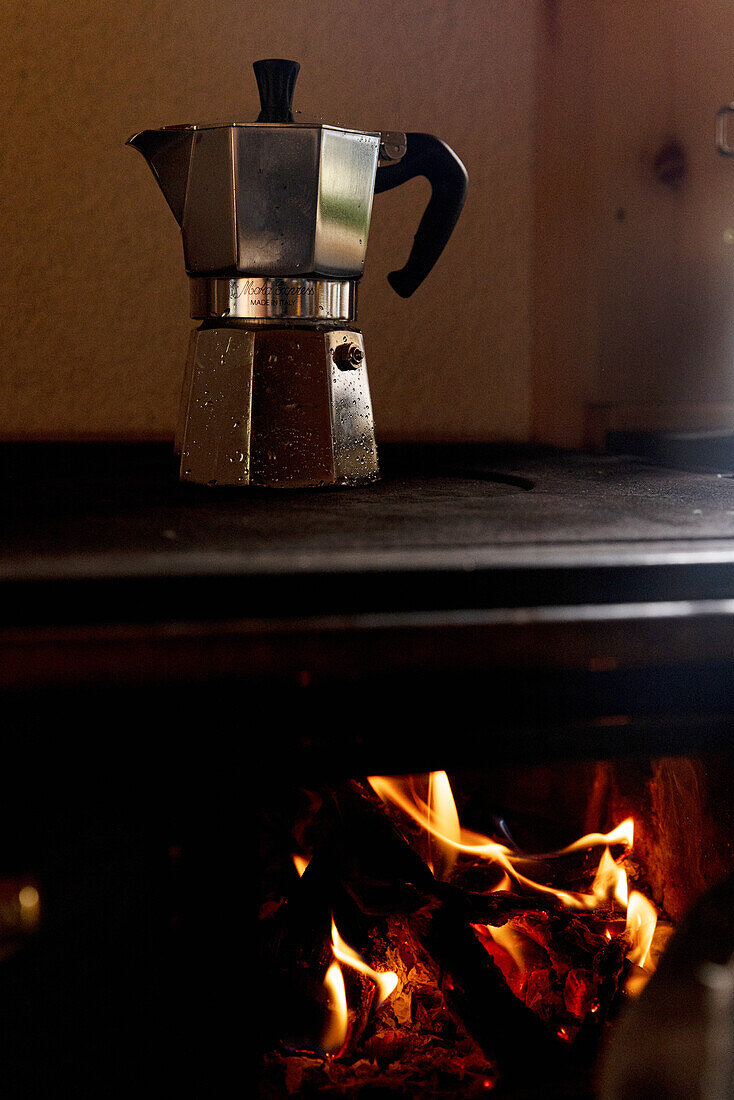 Espresso maker on traditional wood stove