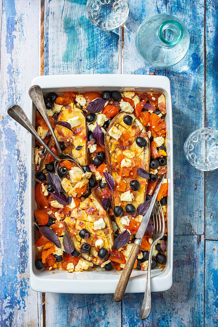 Baked aubergines with feta and black olives