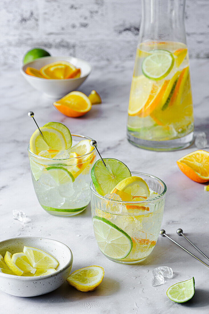 Homemade lemonade with fresh citrus fruits