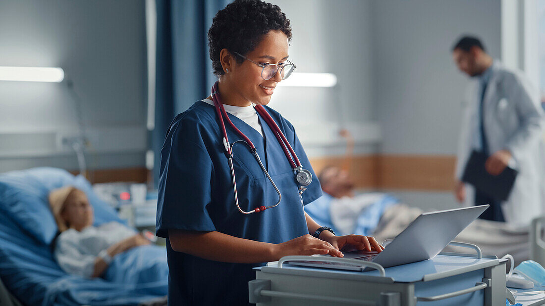 Healthcare professional using laptop