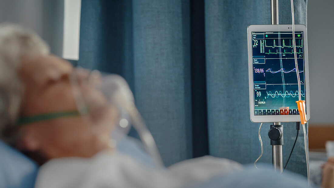 Elderly patient wearing oxygen mask