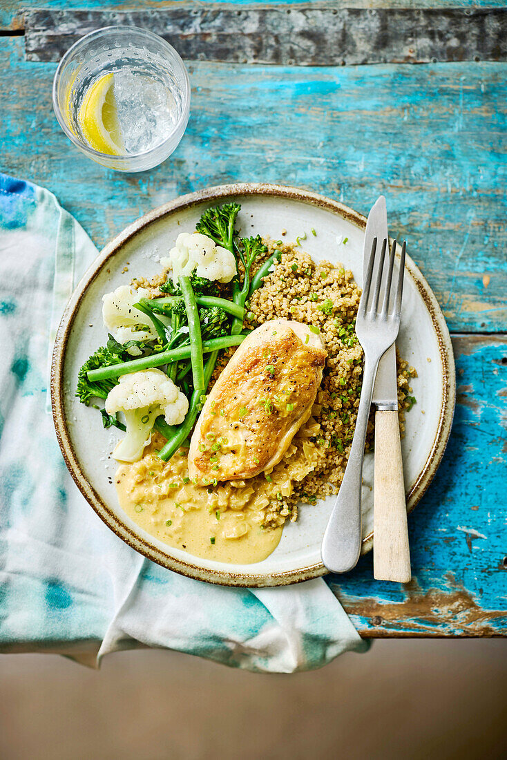 Creamy Marmite chicken with quinoa, collard greens and beans