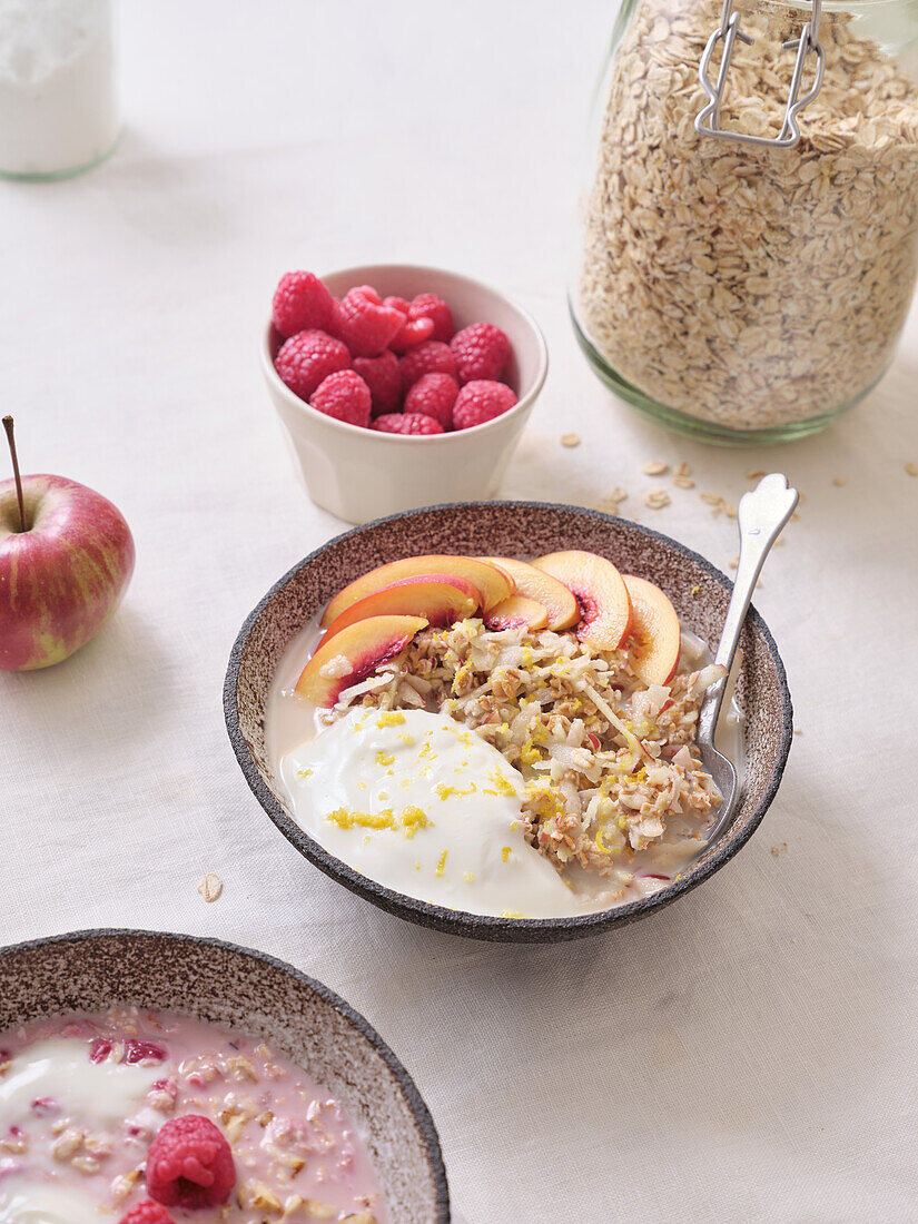 Overnight oats with yoghurt, fresh nectarine and raspberries