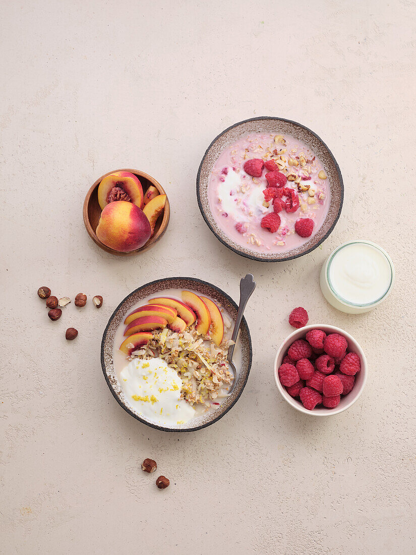 Two variations of overnight oats: with peaches and raspberries