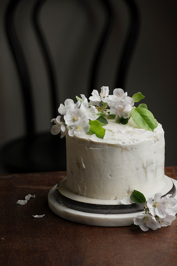 Ganache cake with white apple blossoms